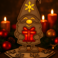 Weihnachtswichtel mit Geschenk